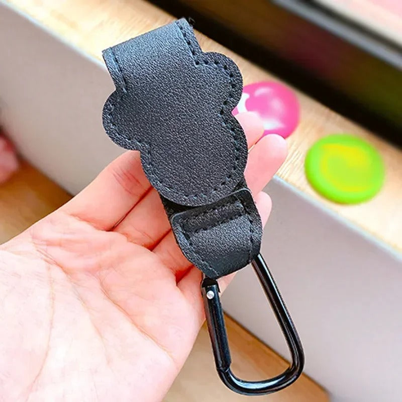 attache poussette noir