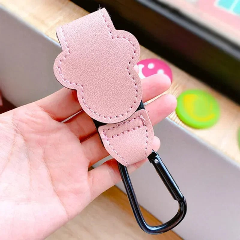 attache poussette rose