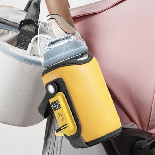chauffe biberon portatif jaune en charge