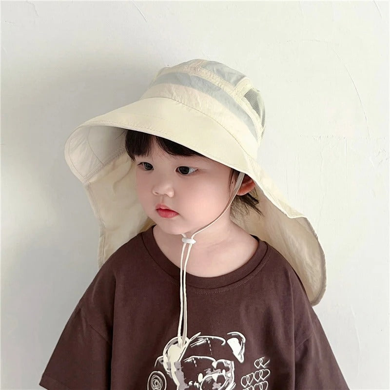 fille-portant-chapeau-bebe-anti-UV